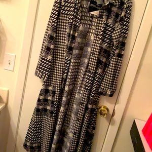 Black and white long sleeve long dress and or over shirt.